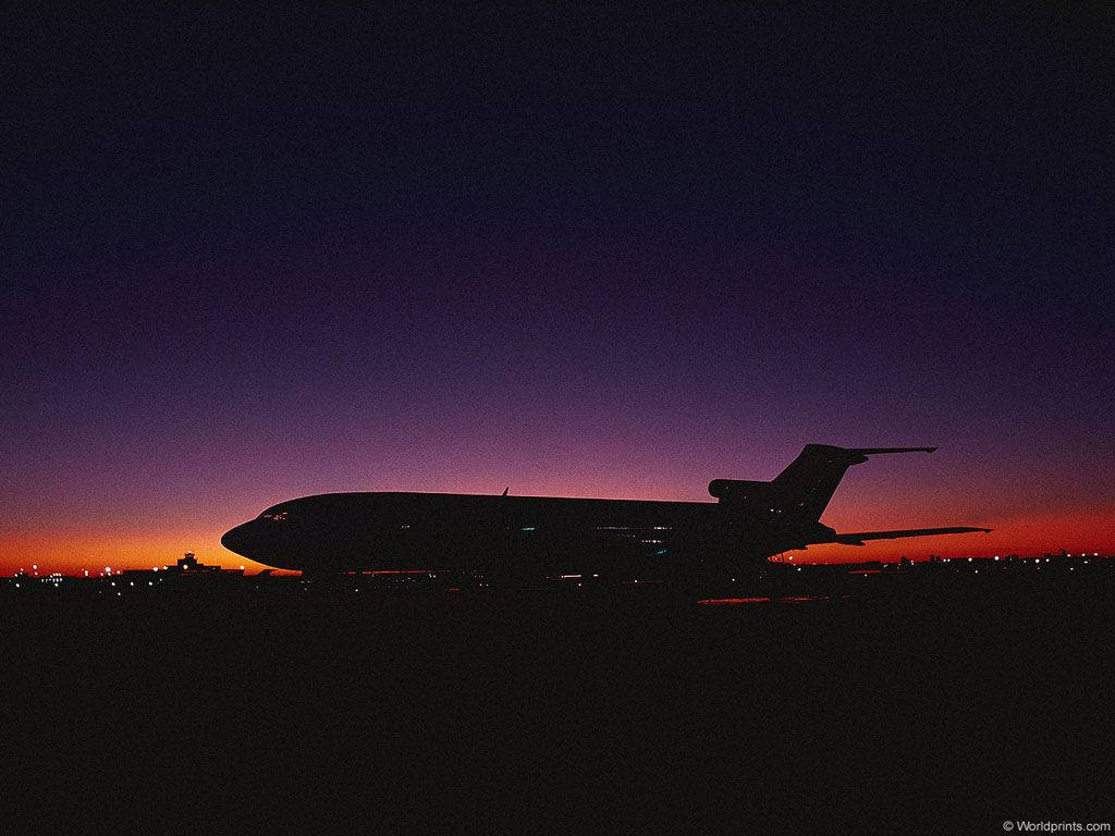 1024x768 Airplane At Sunset Wallpaper