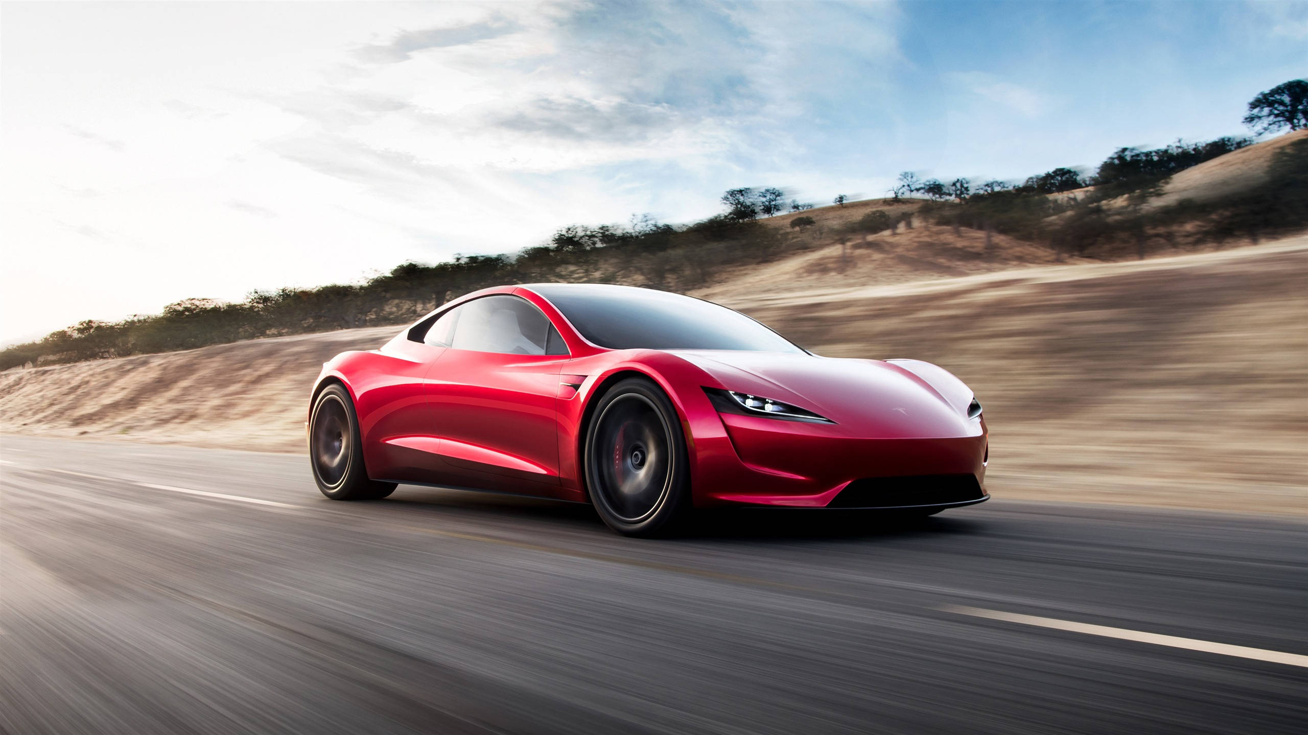 2560x1440 Car Red Tesla Roadster Wallpaper