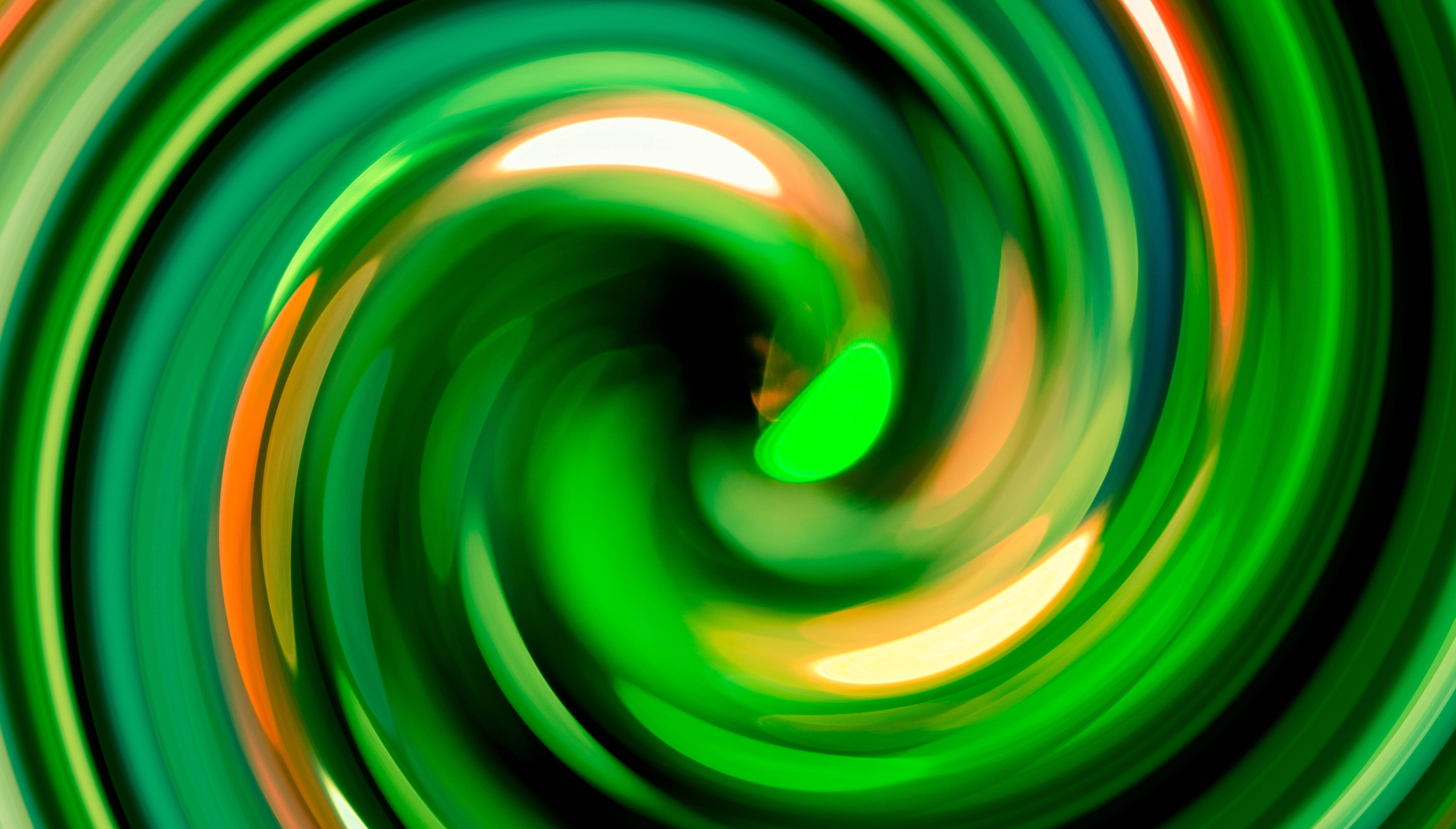 4k Green And Orange Light Swirls Wallpaper