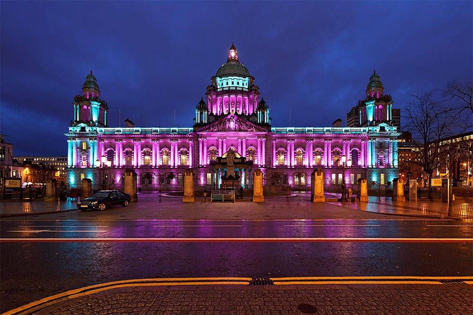 A Building With Lights On It Wallpaper