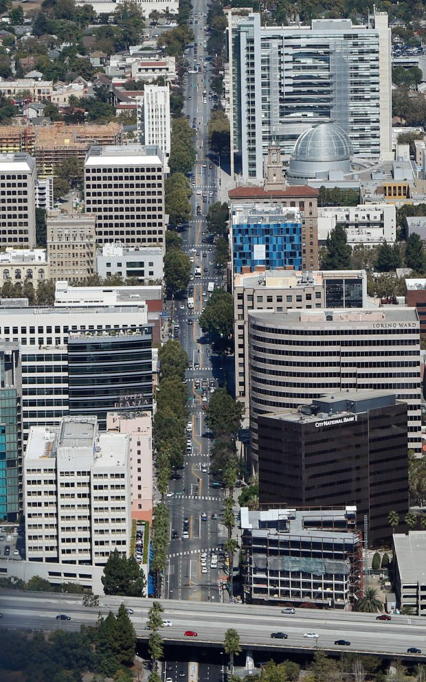 A City Street With Buildings Wallpaper