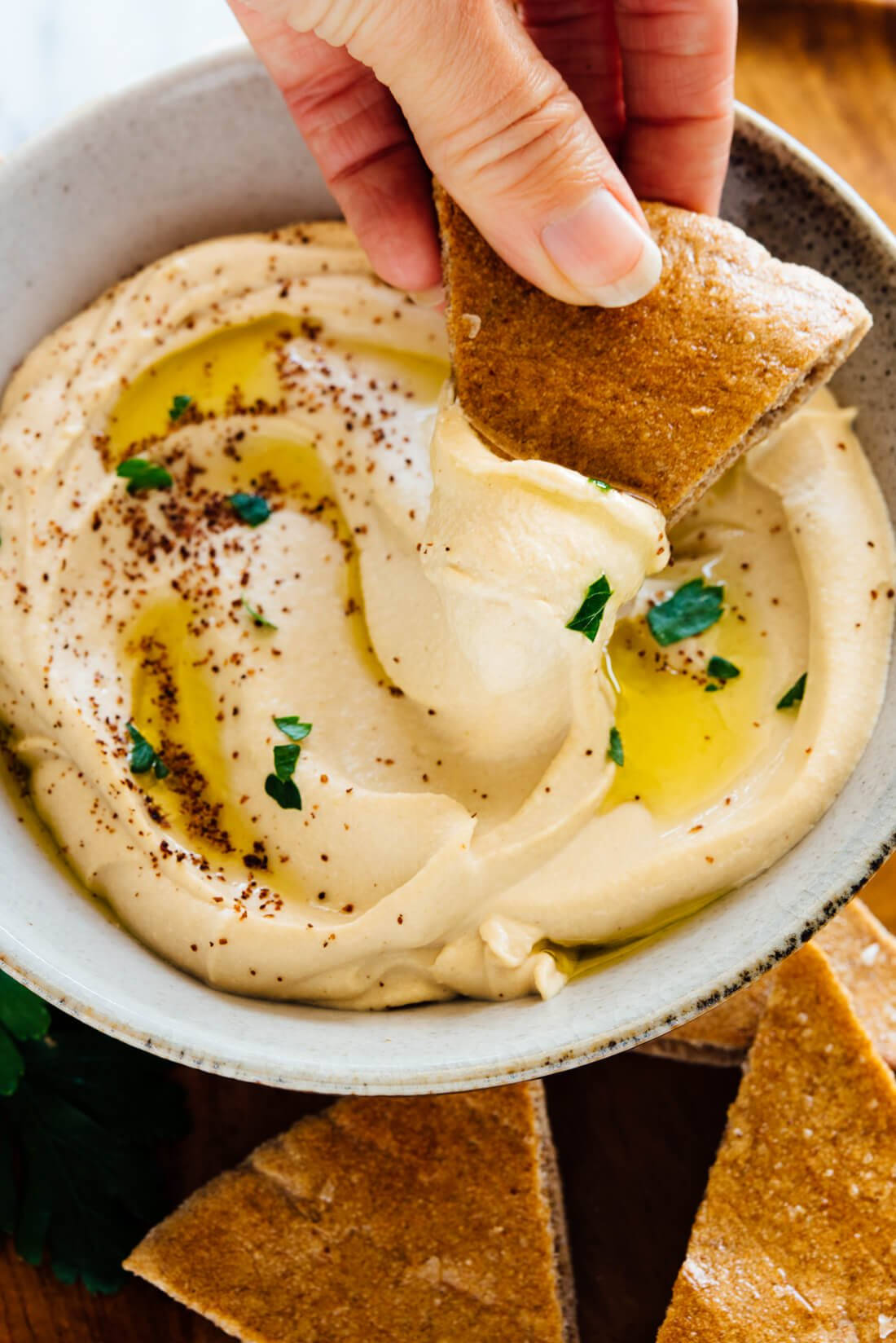 A Close-up View Of Hummus Dip With Pita Bread Wallpaper