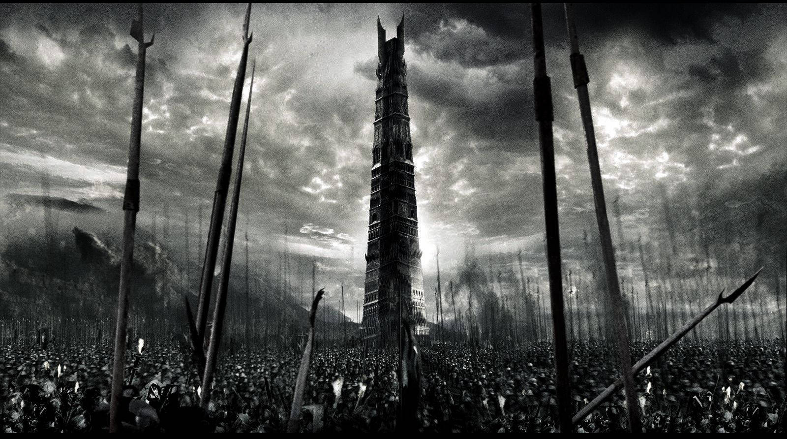 A Glimpse Of The Tower Of Orthanc In Isengard Wallpaper