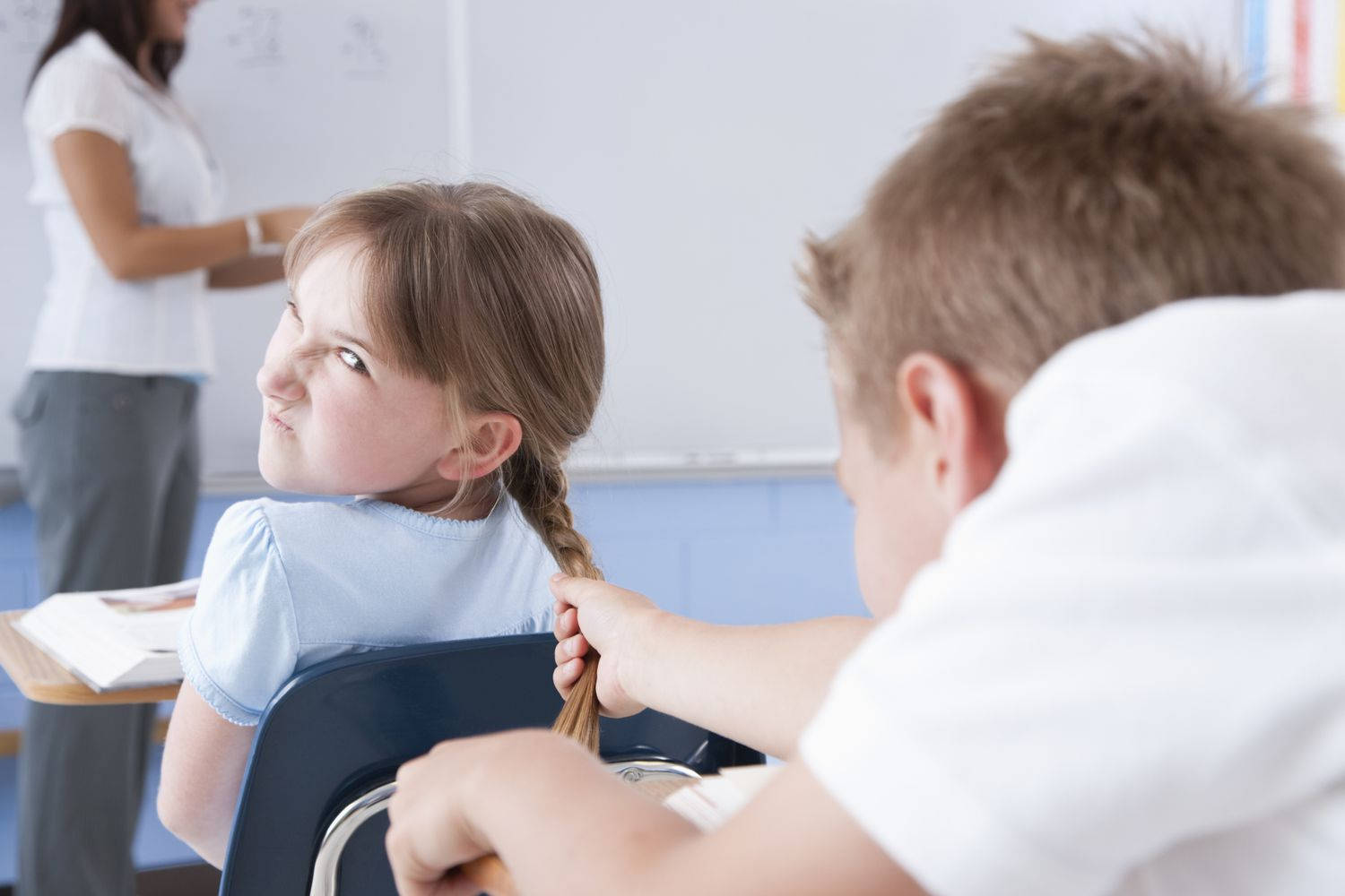 A Growing Boy Displaying Aggression Through Hair-pulling. Wallpaper