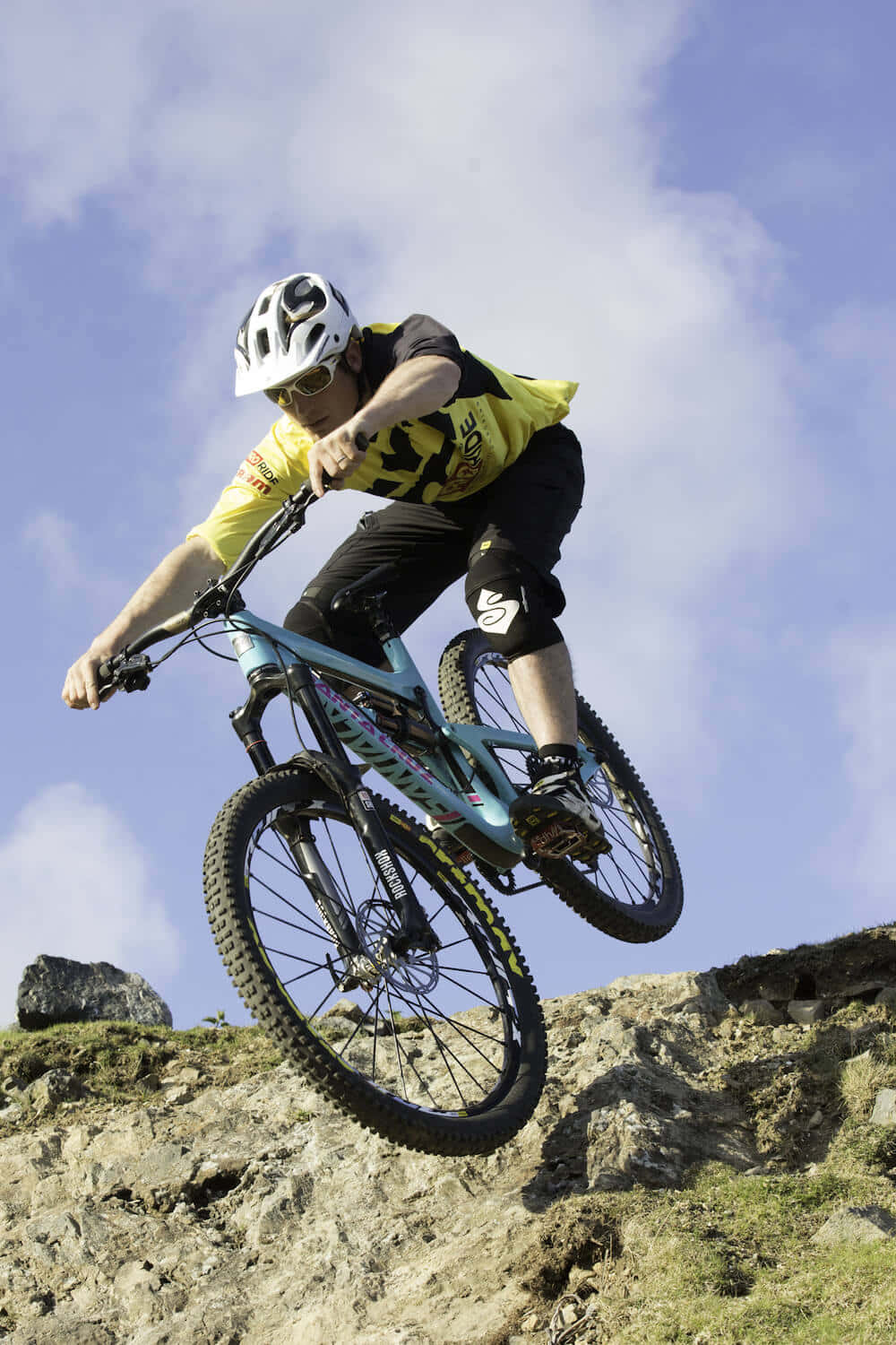 A Man Riding A Mountain Bike Wallpaper