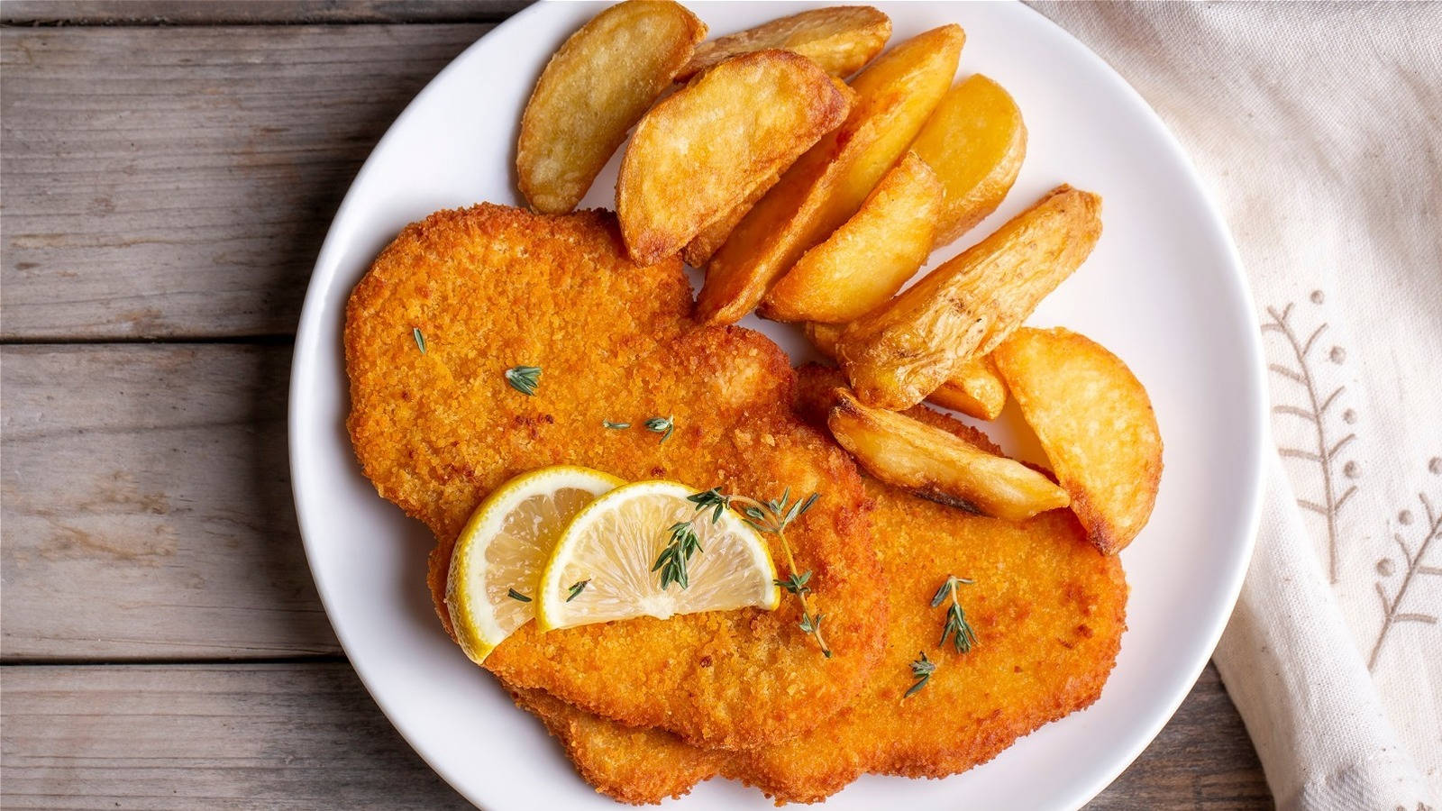 A Platter Of Authentic Wiener Schnitzel Wallpaper