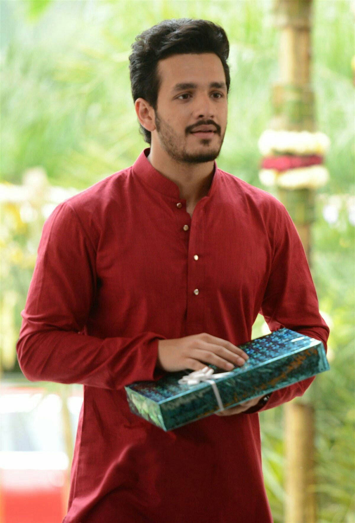 Akhil Akkineni Posing With A Gift Wallpaper