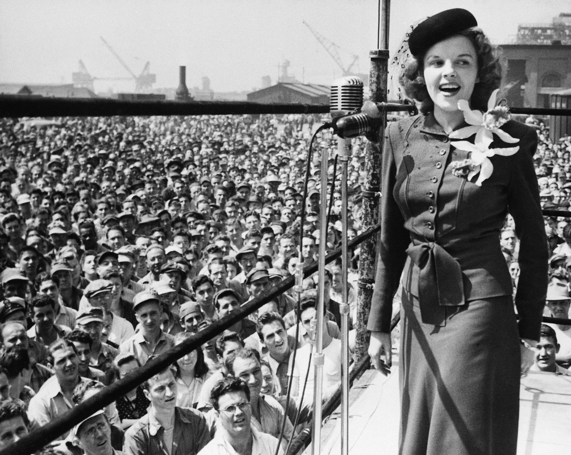 American Actress Judy Garland Performing During A Uso Tour Wallpaper