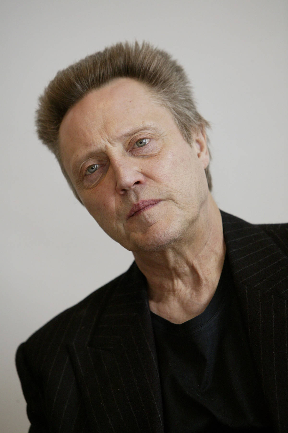 An Elegant Christopher Walken In A Black Suit Wallpaper