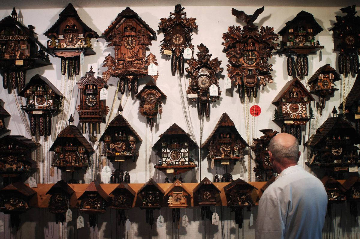 Antique German Cuckoo Clocks Exhibit Wallpaper