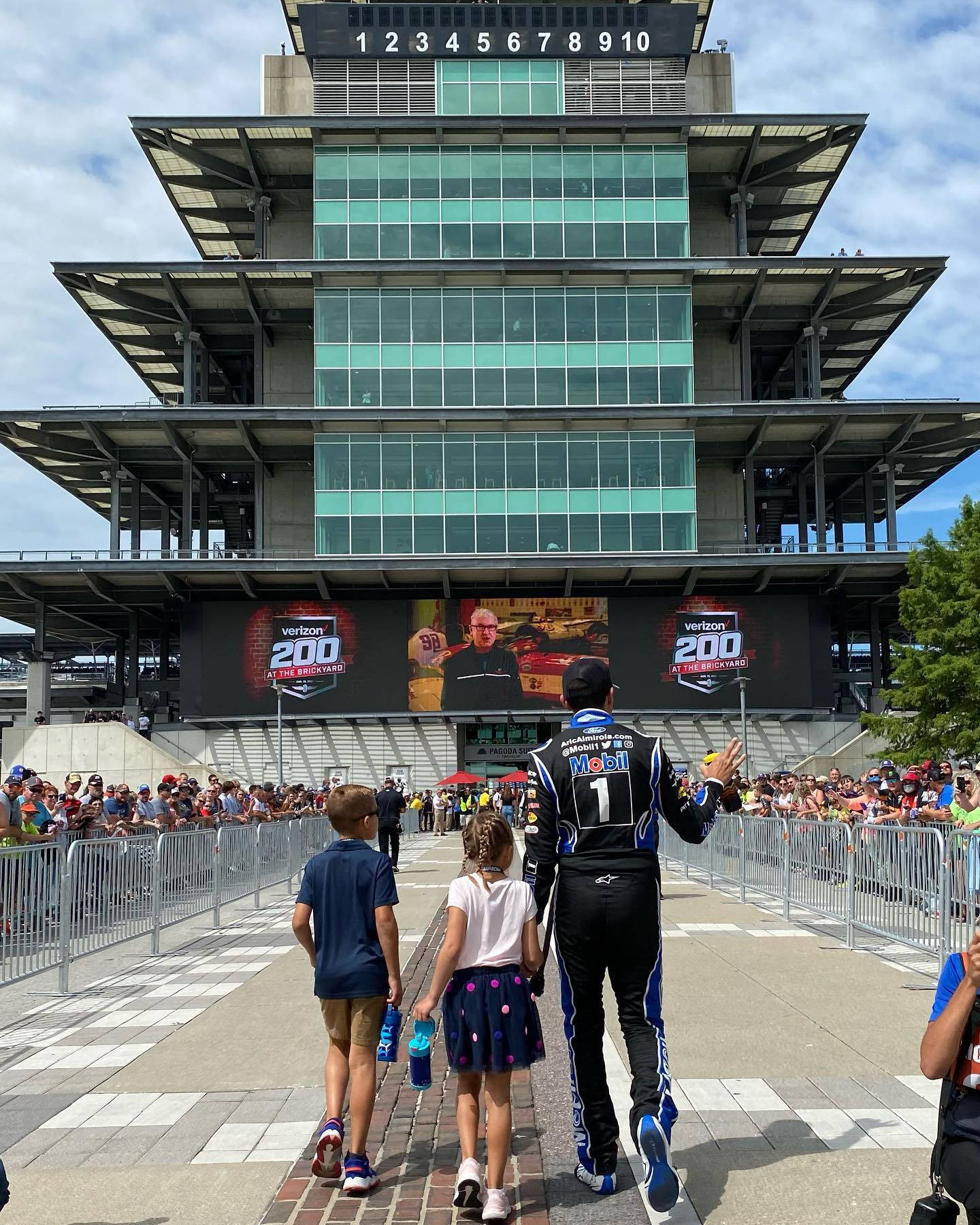 Aric Almirola Glass Building Wallpaper