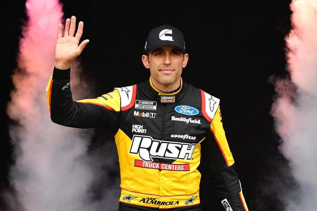 Aric Almirola Waving Wallpaper