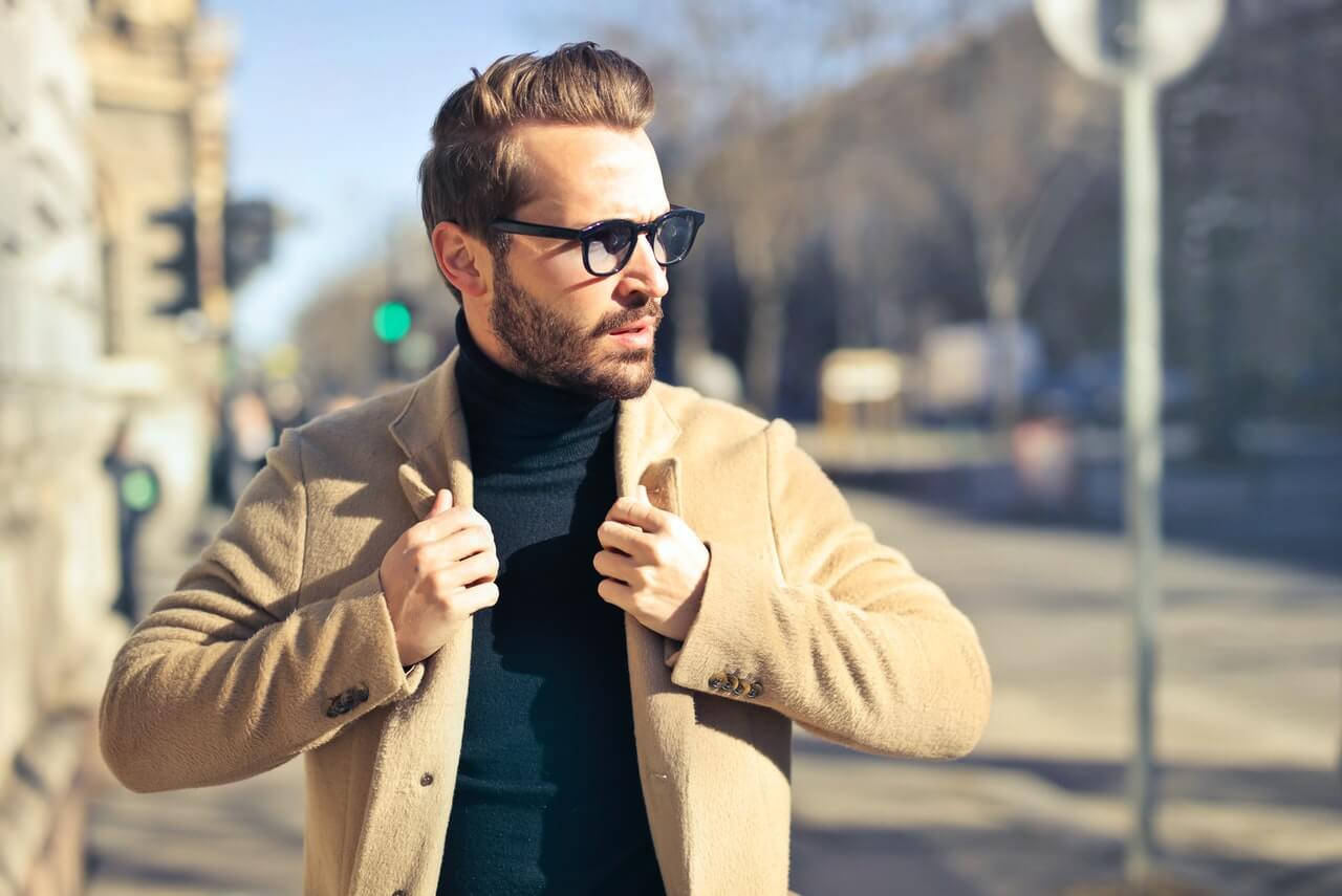 Arrogant Man Wearing Thick Coat Wallpaper