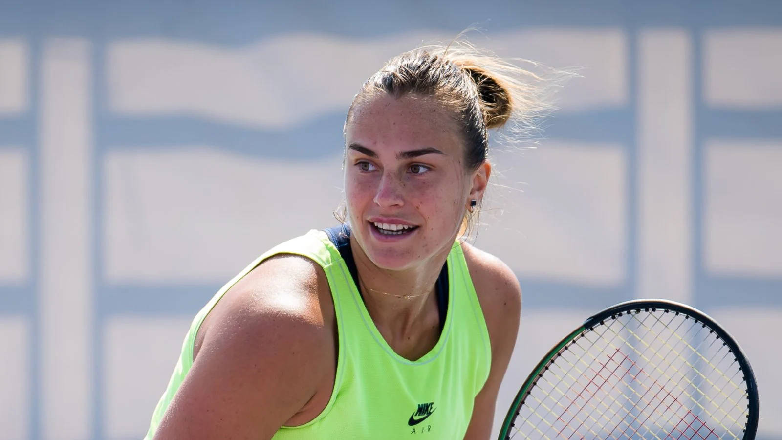 Aryna Sabalenka Dazzles In Bright Yellow Sportswear Wallpaper