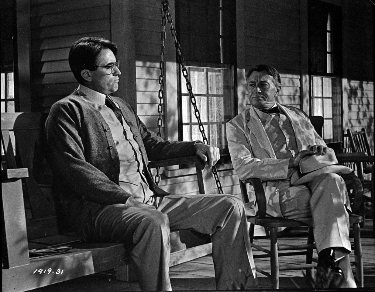 Atticus Finch And Judge Taylor In A Crucial Scene From The Classic 'to Kill A Mockingbird' Wallpaper