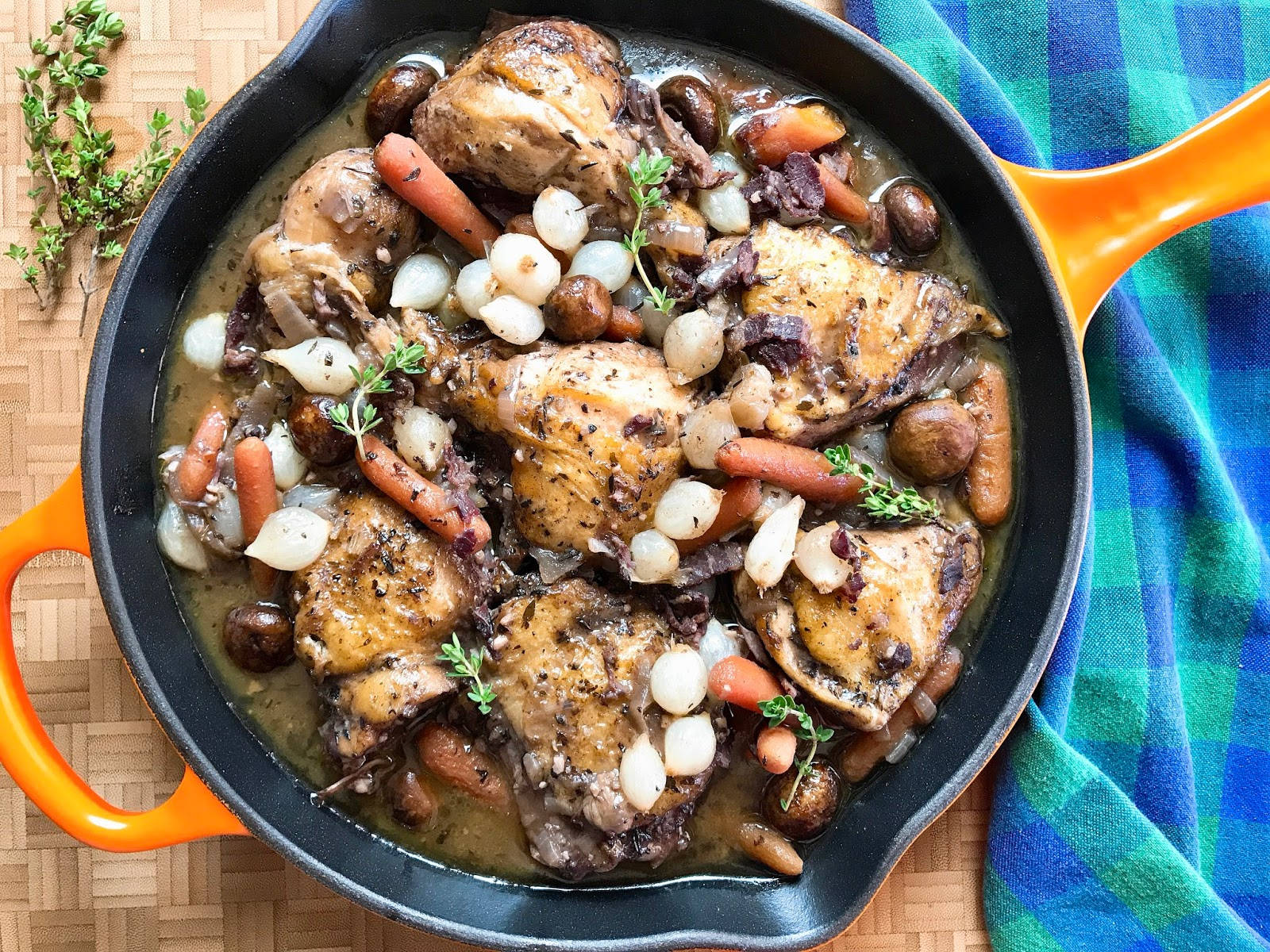 Authentic Coq Au Vin Garnished With Pearl Onions Wallpaper