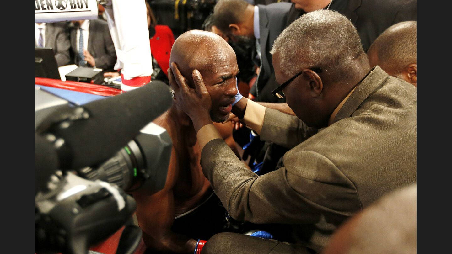 Bernard Hopkins Comforted By His Coach Wallpaper