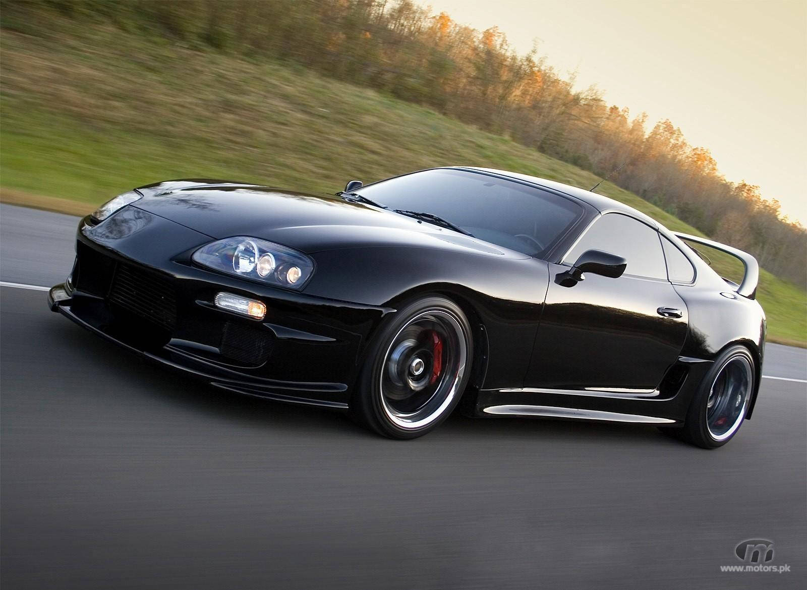 Black 1998 Toyota Supra Mk4 On The Road Wallpaper