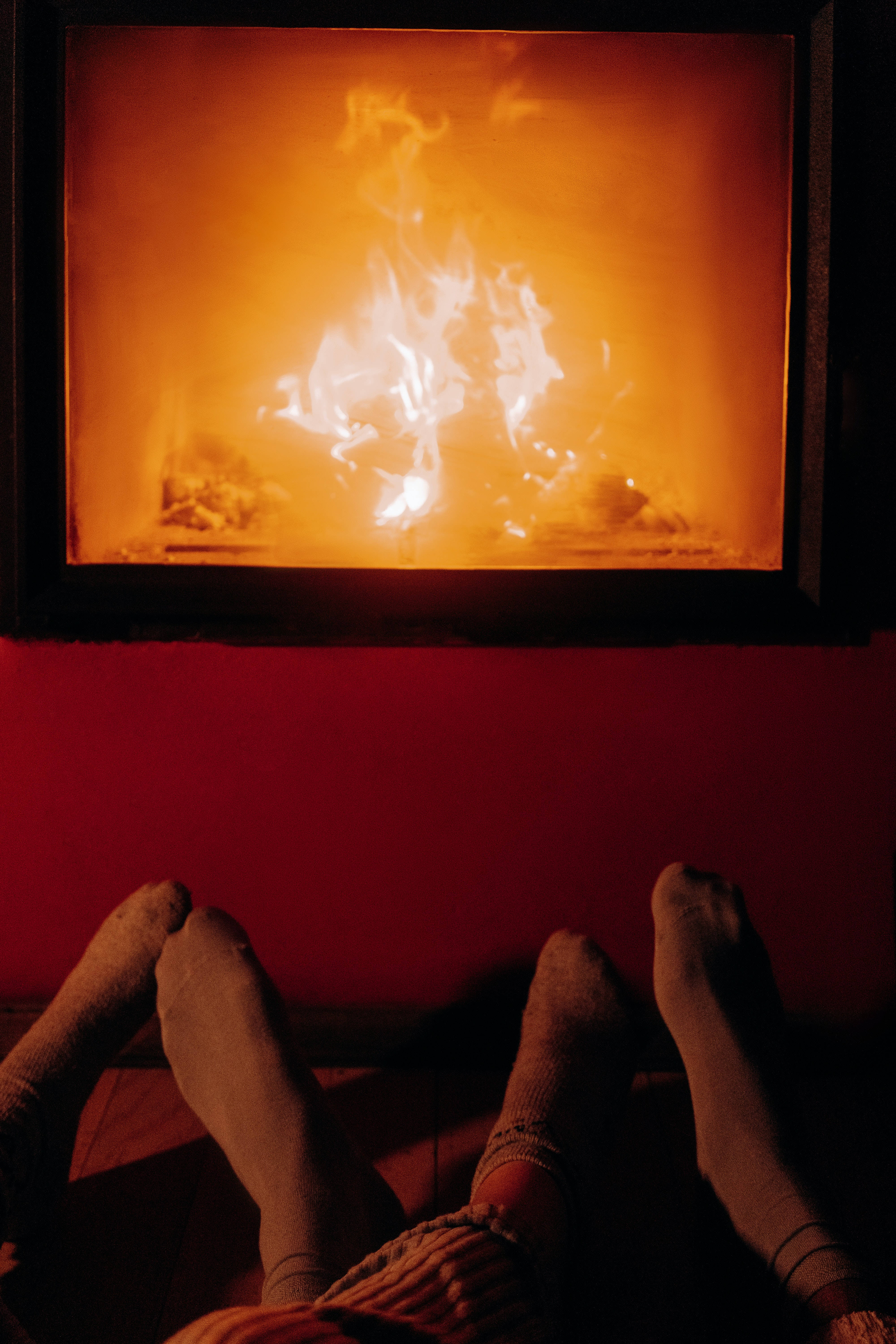 Boyfriend And Girlfriend By The Fireplace Wallpaper