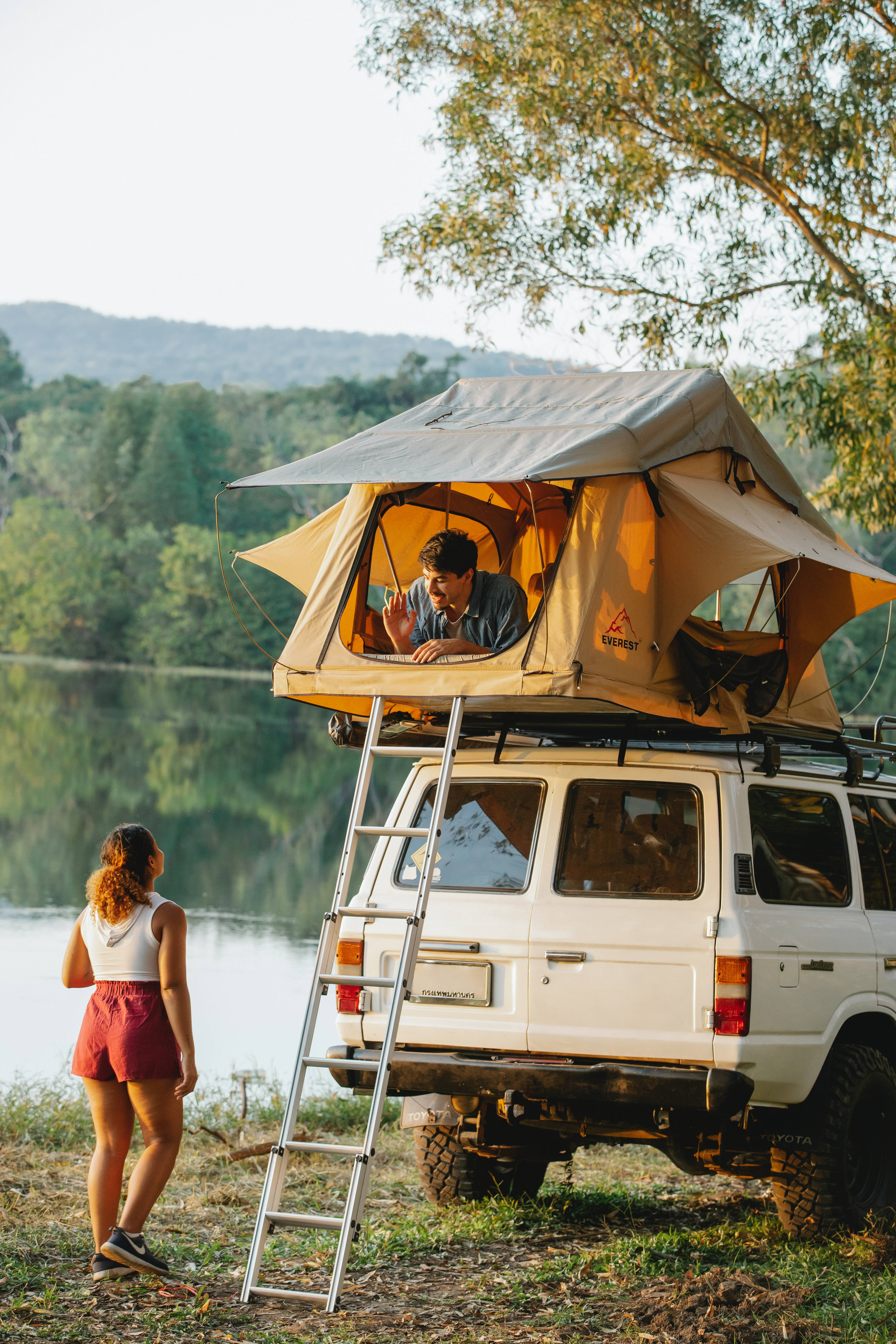 Boyfriend And Girlfriend Camping Wallpaper