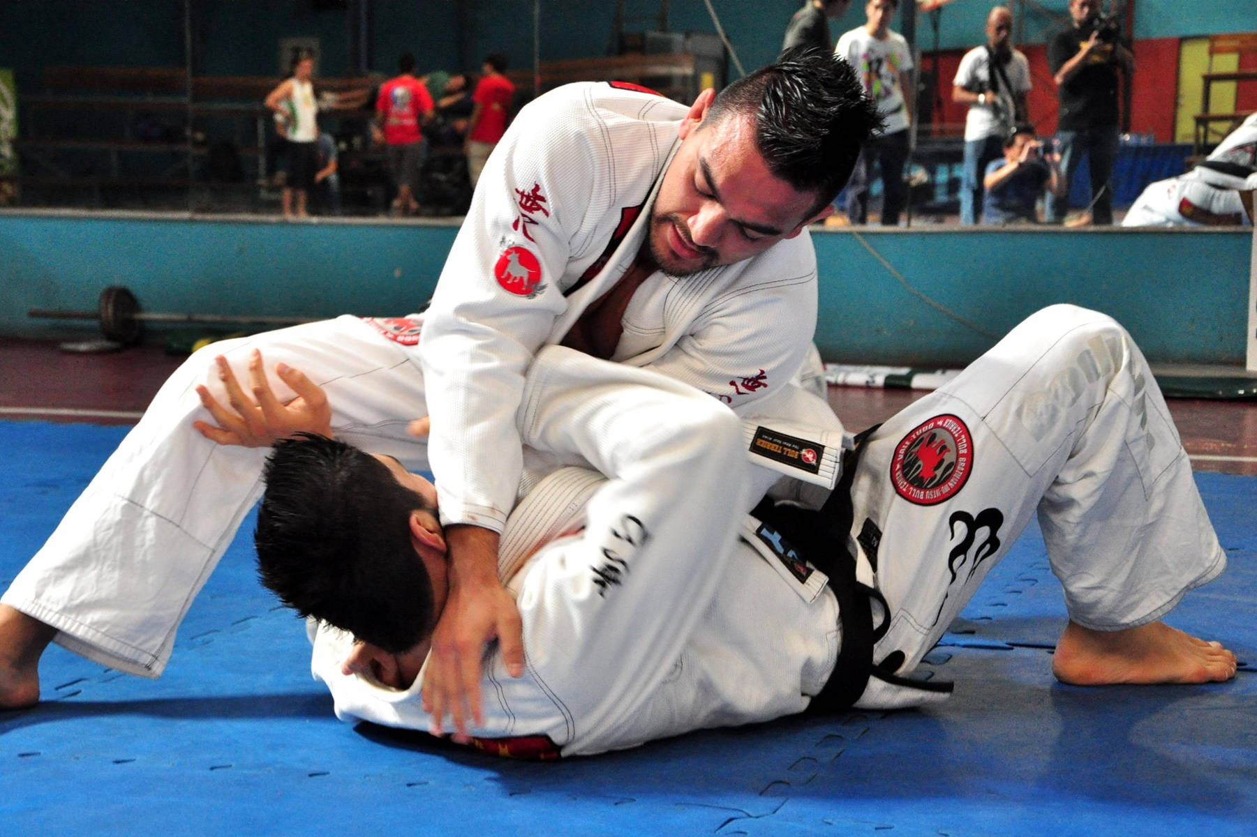 Brazilian Jiu-jitsu Masters Marcos And Roberto De Souza In Action Wallpaper