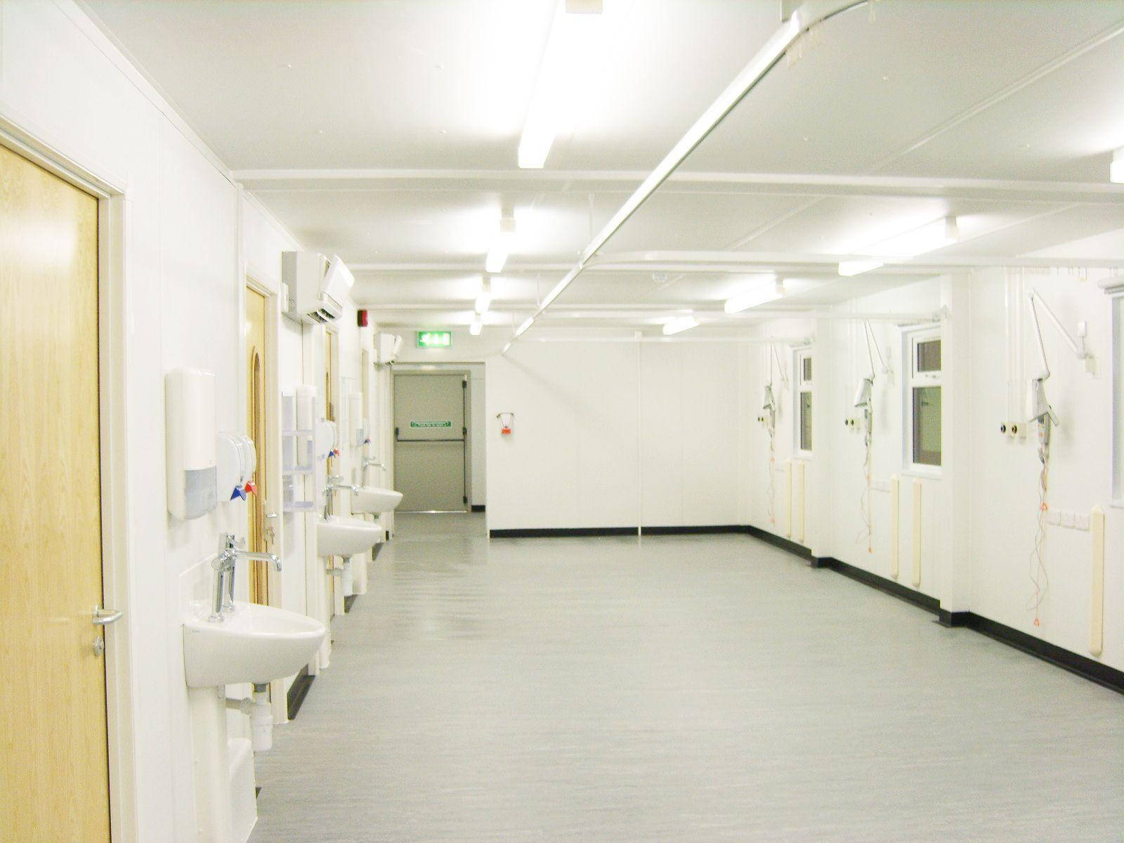 Bright Modern Hospital Hallway Wallpaper