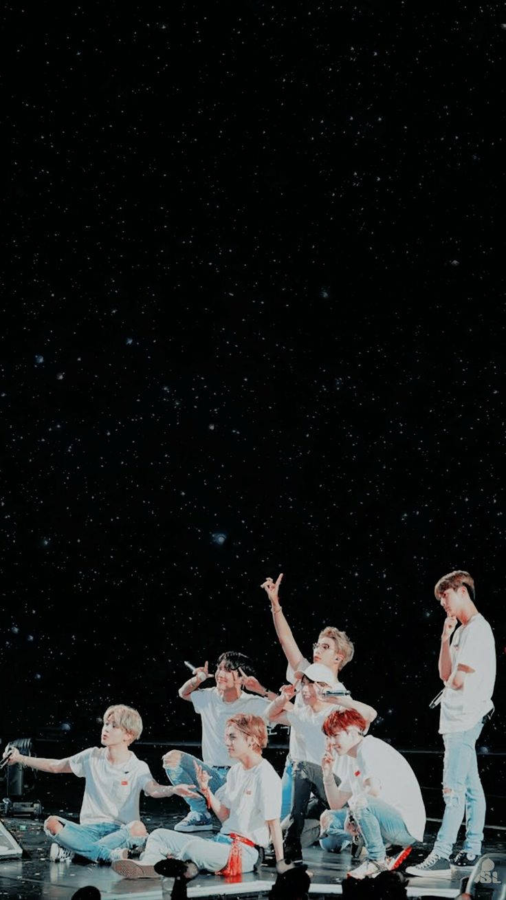 Bts Posing On Their Love Yourself Concert Tour Wallpaper