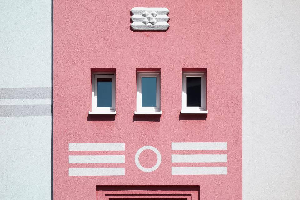 Building Facade With Pink Wall Wallpaper