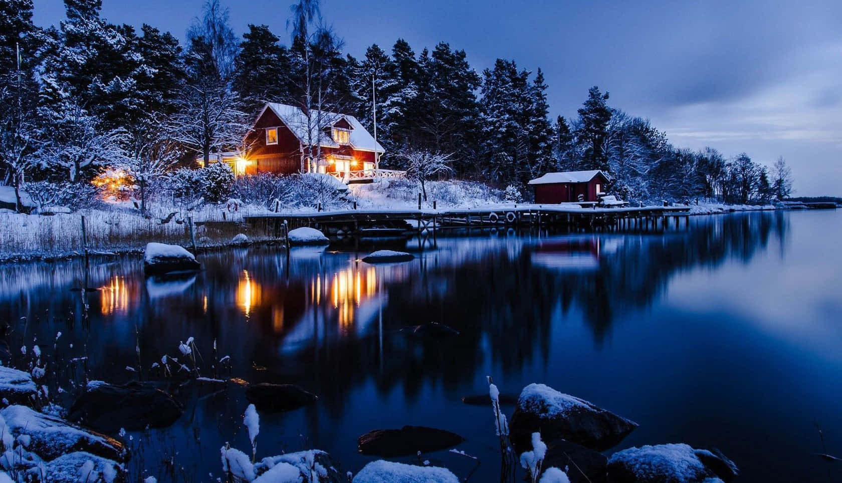 Cabin Beside A Freezing River Wallpaper