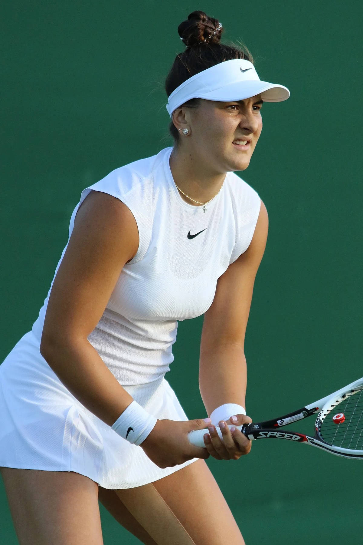 Canadian Tennis Star Bianca Andreescu In An All-white Attire Wallpaper