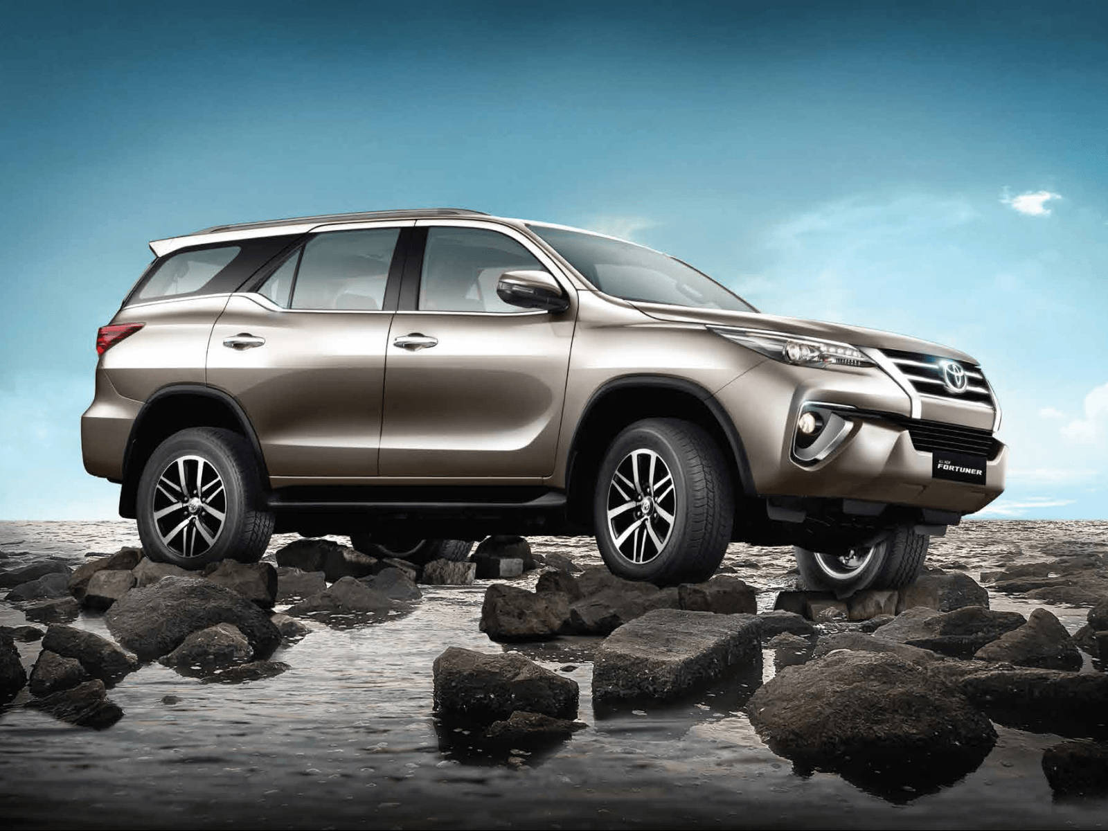 Caption: Elegance In Motion - Toyota Fortuner In Gray Metallic Wallpaper