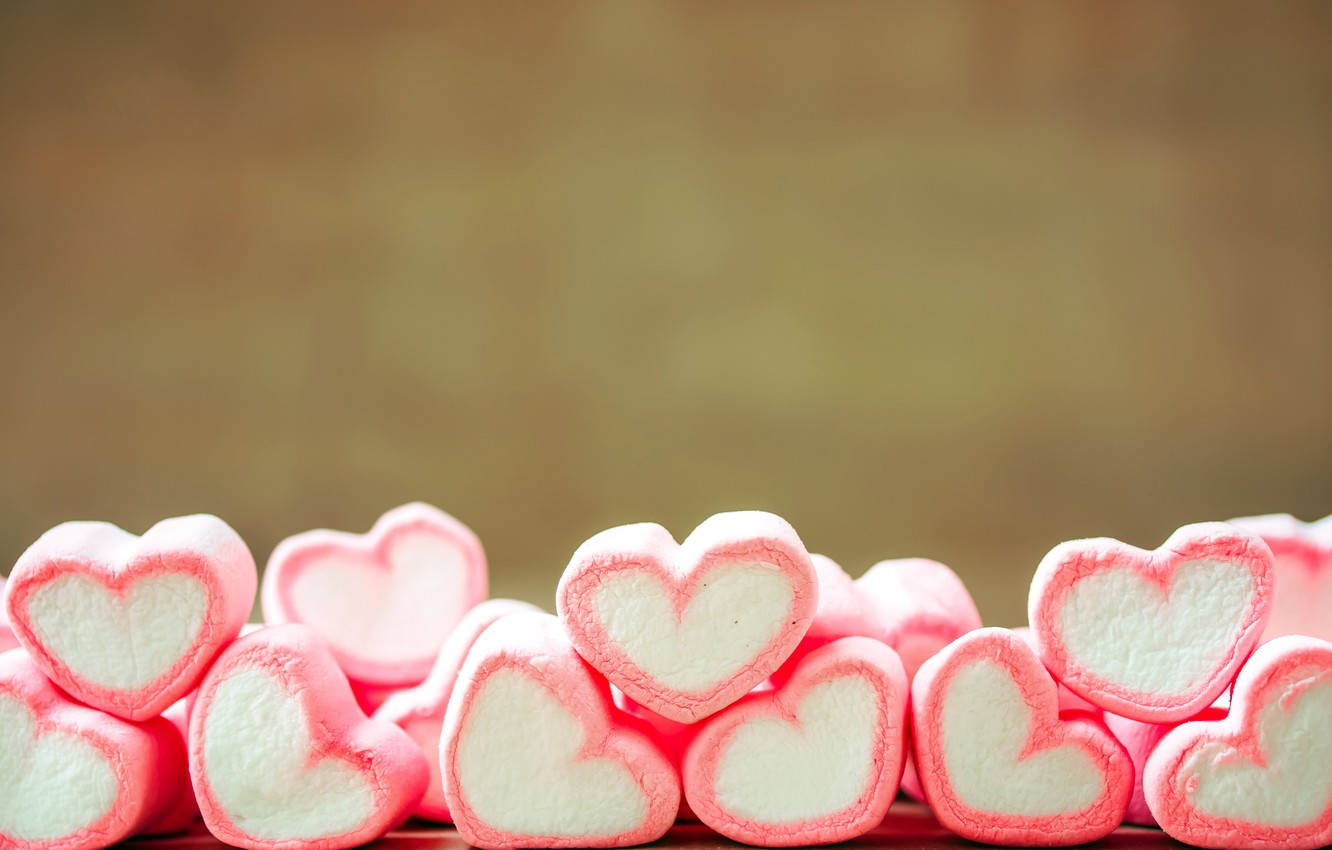 Caption: Enchanting 3d Marshmallow Hearts Lined Up In Perfect Harmony Wallpaper