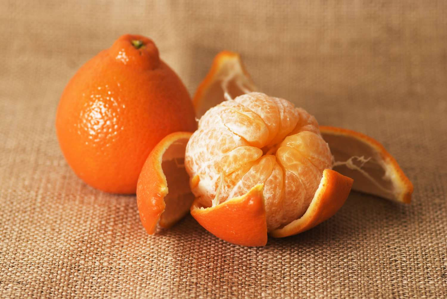 Caption: Fresh Tangelo Fruit On A Knitted Cloth Wallpaper