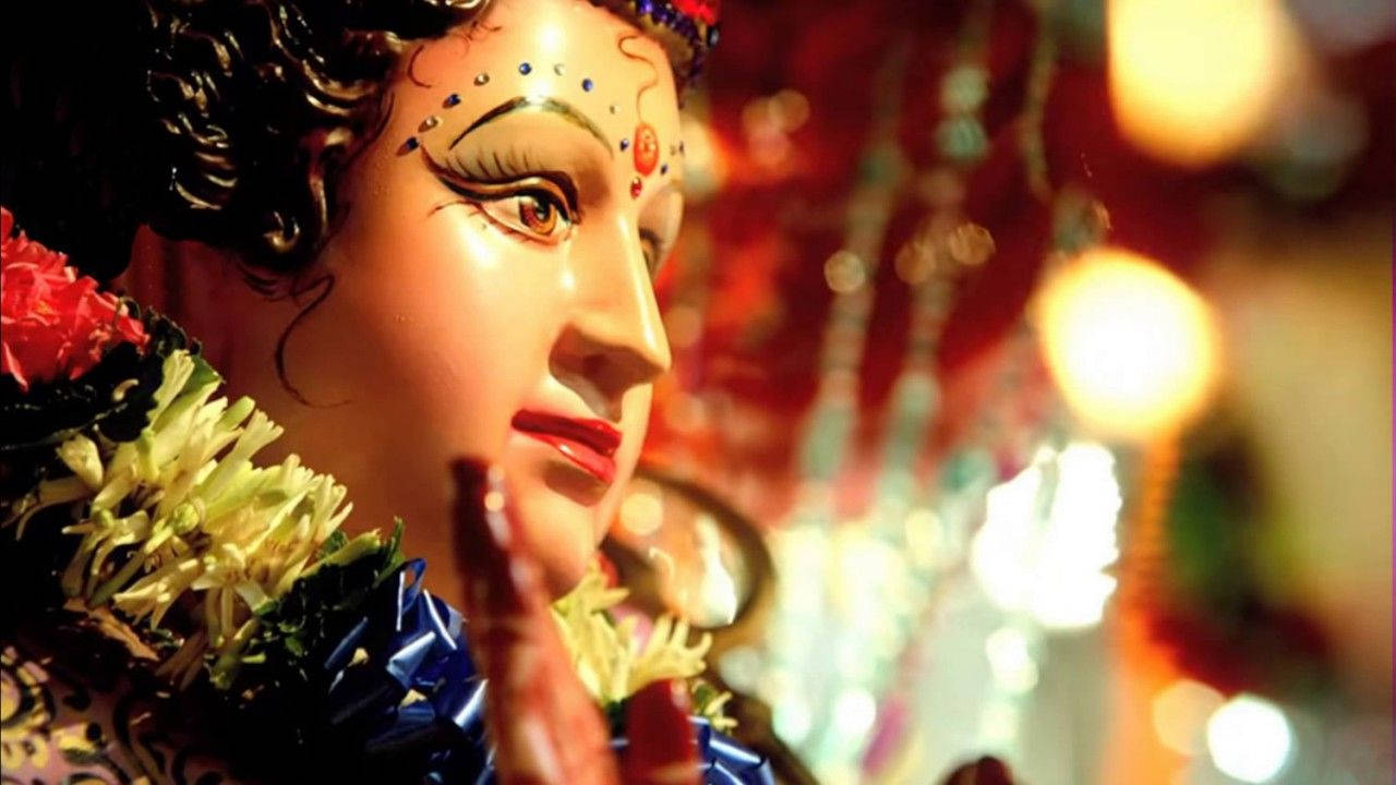 Caption: Graceful Statue Of Santoshi Maa Wallpaper