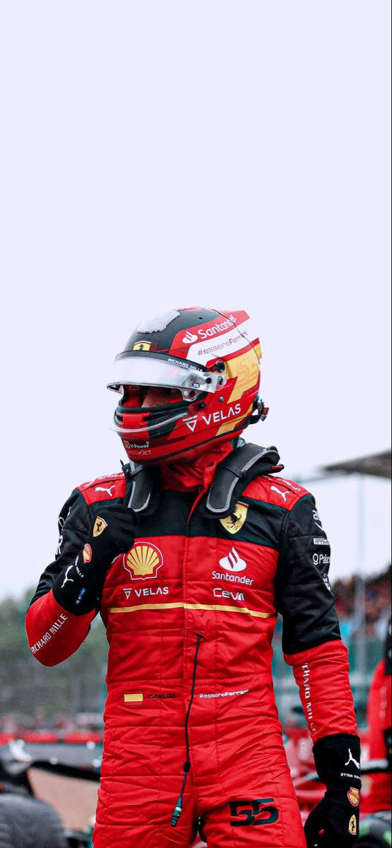 Carlos Sainz Jr. In His Full Racing Suit, Ready For Action. Wallpaper