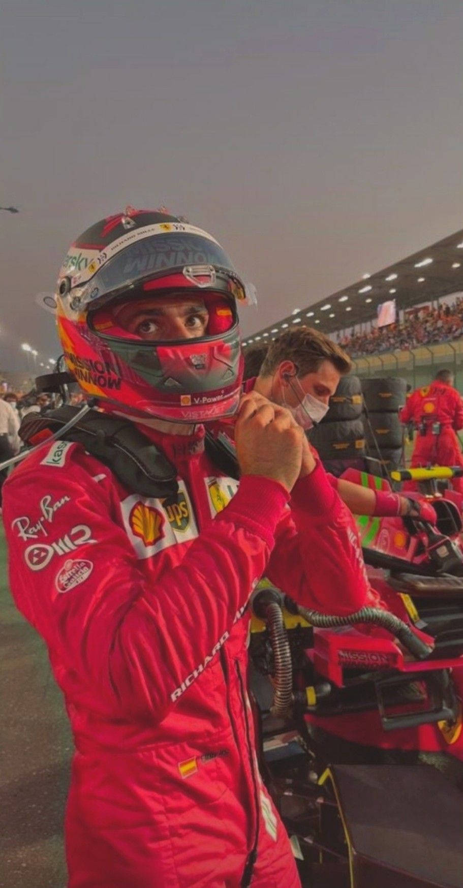 Carlos Sainz Jr Removing Helmet Wallpaper