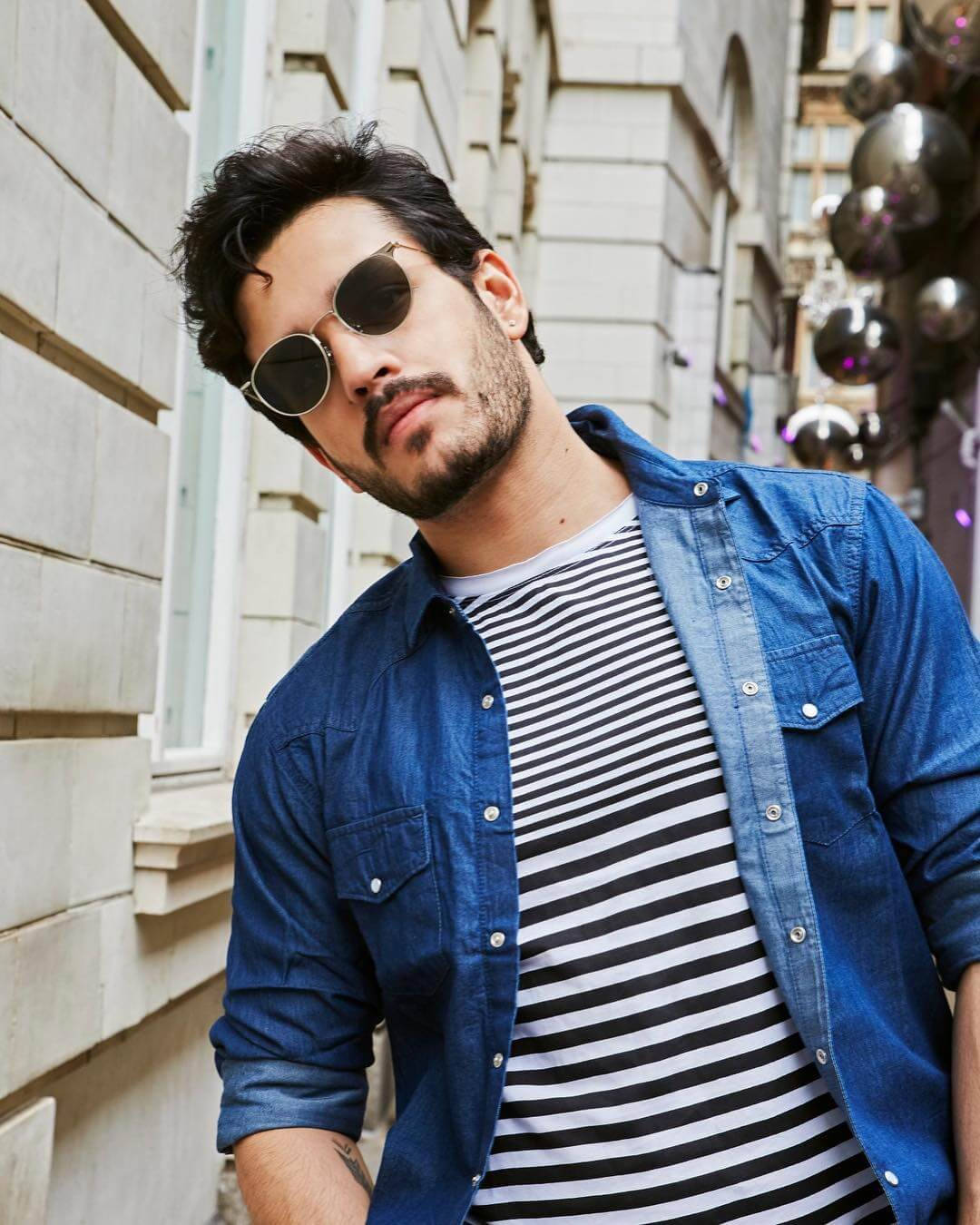 Casual Akhil Akkineni With Shades Wallpaper