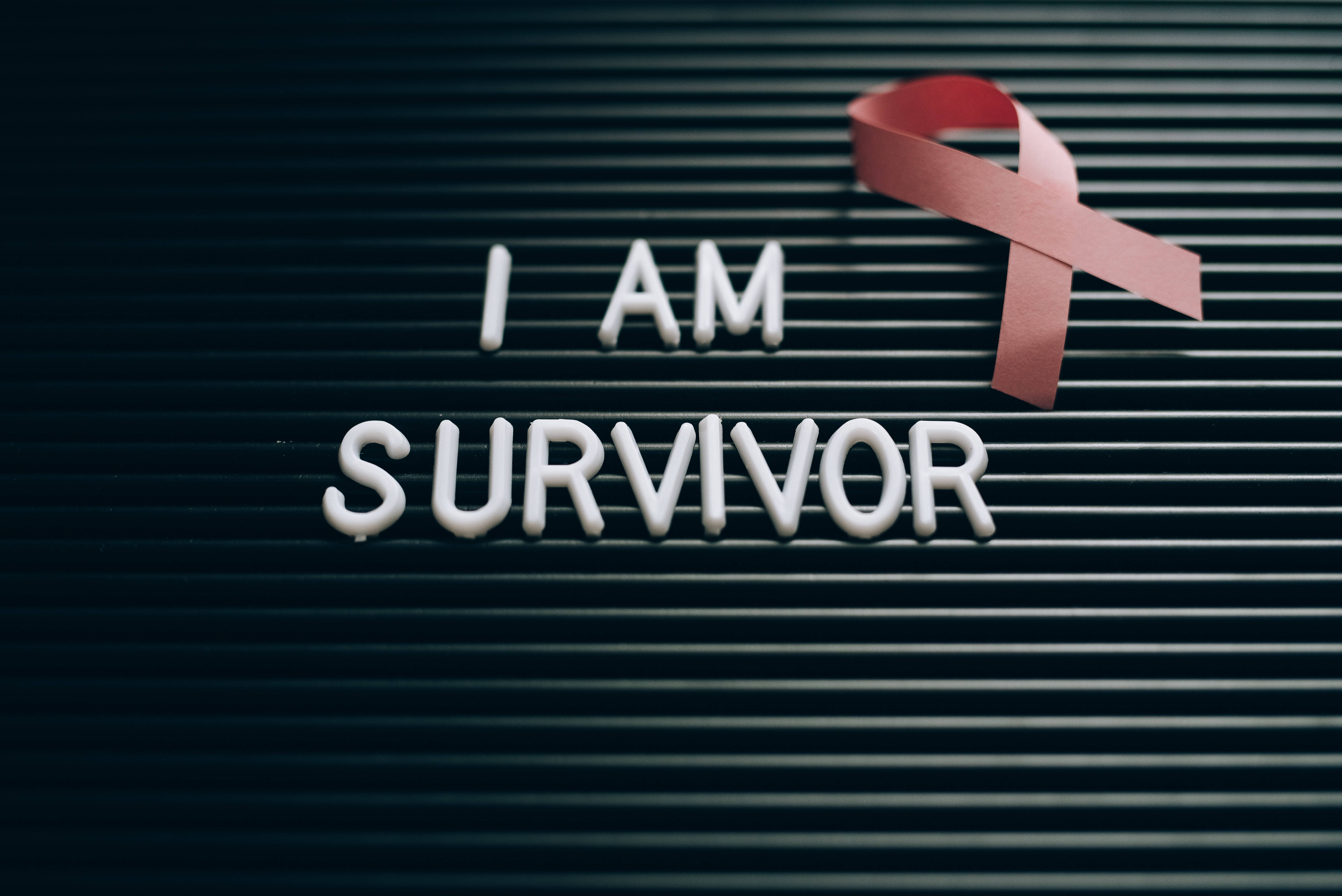 Champion Of Hope - Breast Cancer Survivor Wallpaper