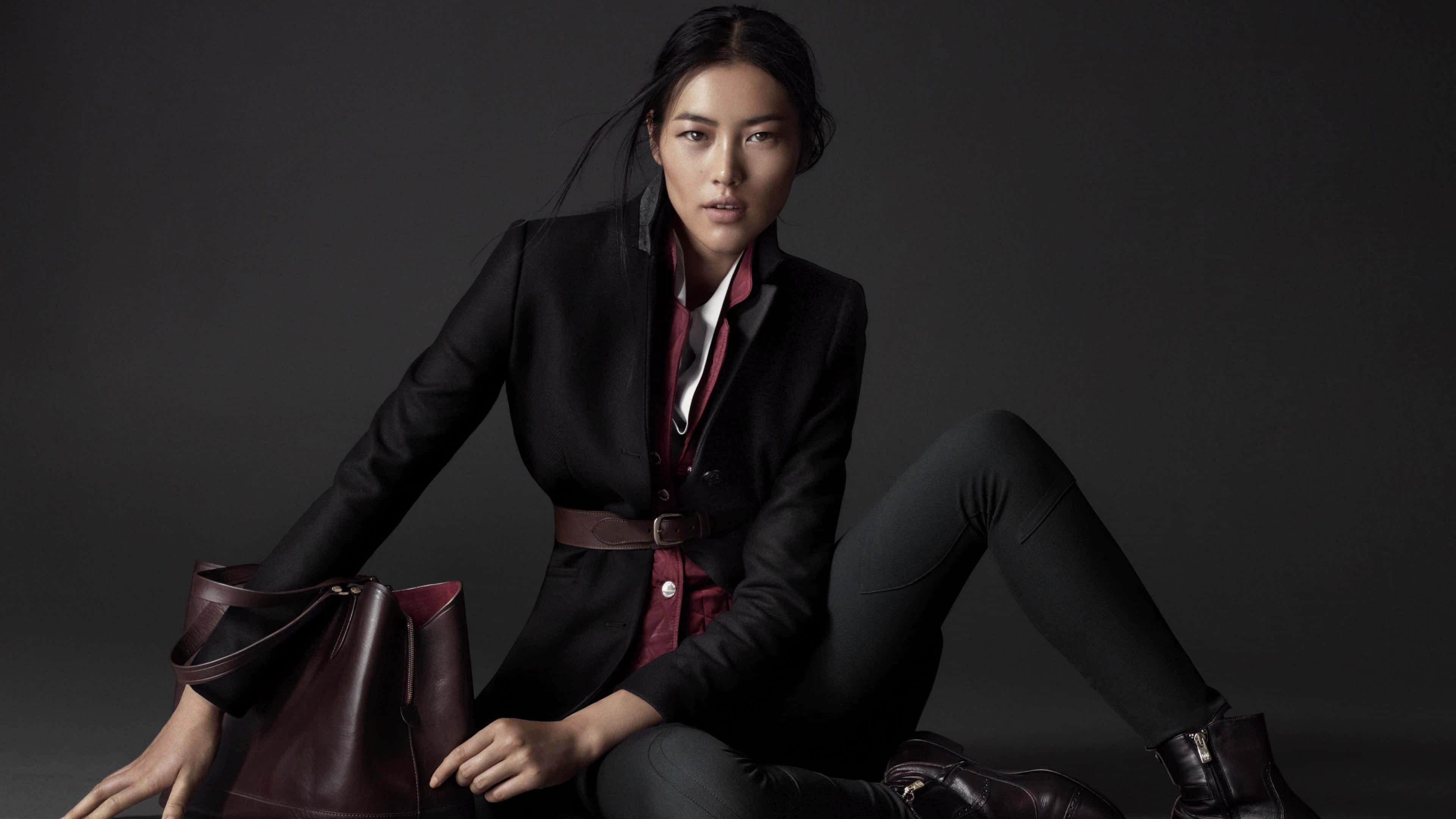 Chic Liu Wen Posing In A Sunlit Room. Wallpaper