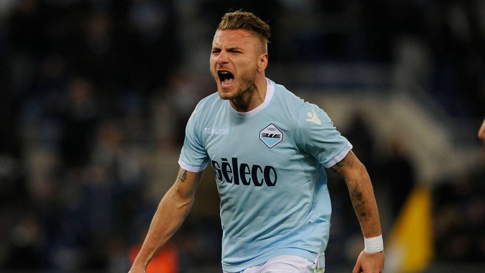 Ciro Immobile In Action On The Football Field Wallpaper