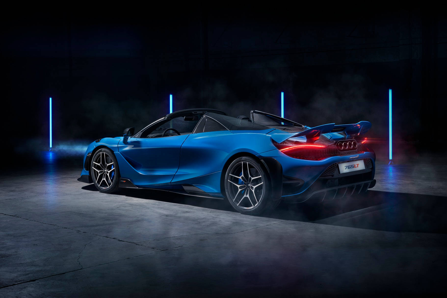 Cool Blue Mclaren Spyder With Fog Wallpaper