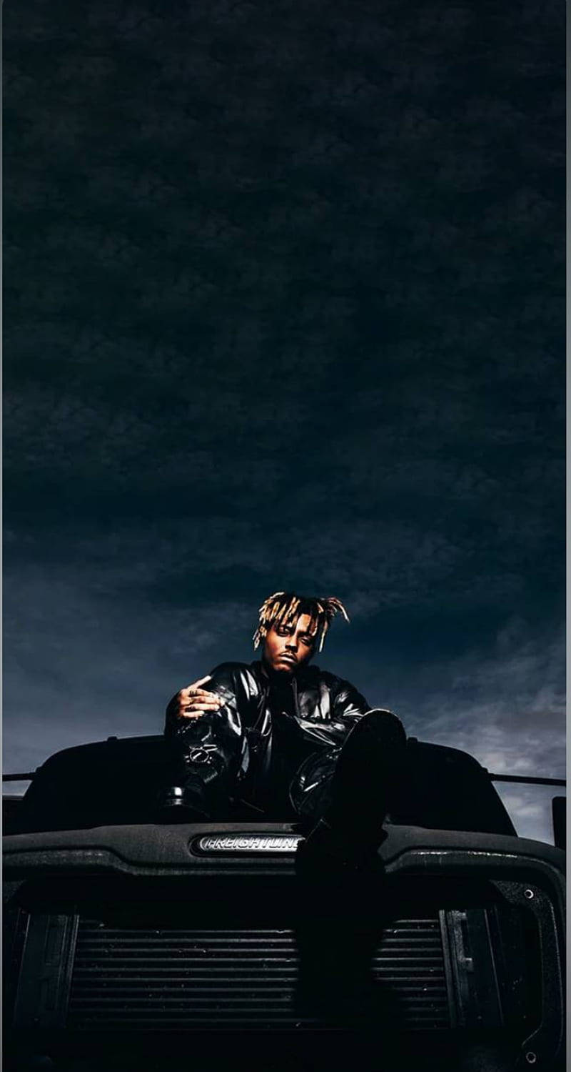 Cool Juice Wrld On A Vehicle’s Hood Wallpaper