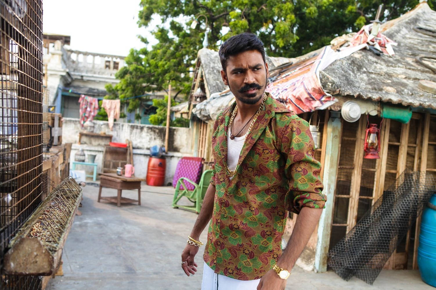 Curious Still Dhanush Wallpaper