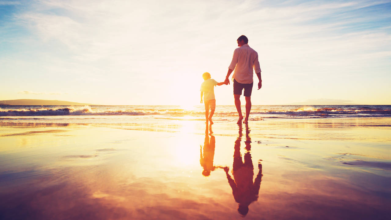 Dad And Child Holding Hands Wallpaper