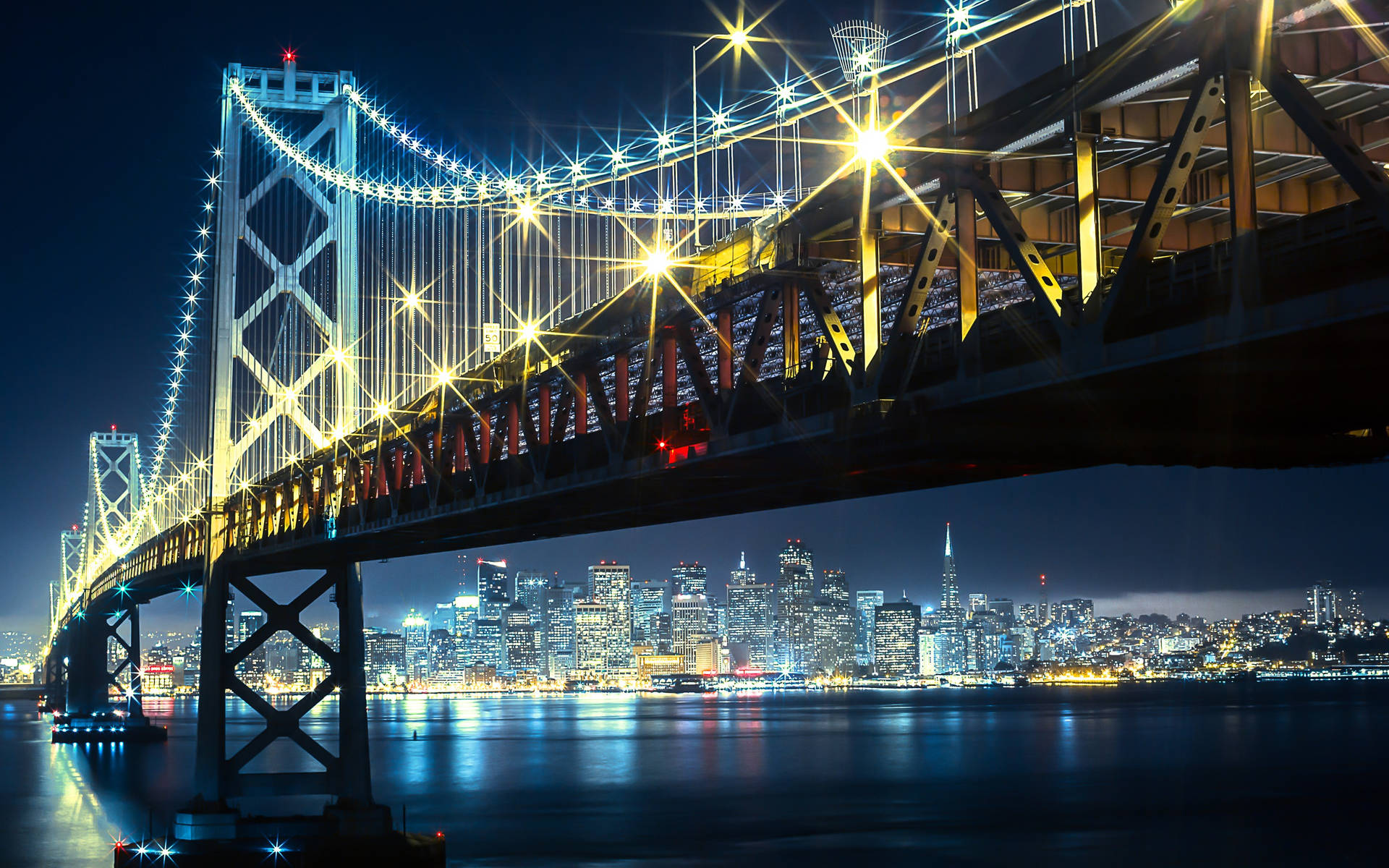 Dazzling View Of The Bay Bridge In San Francisco Wallpaper