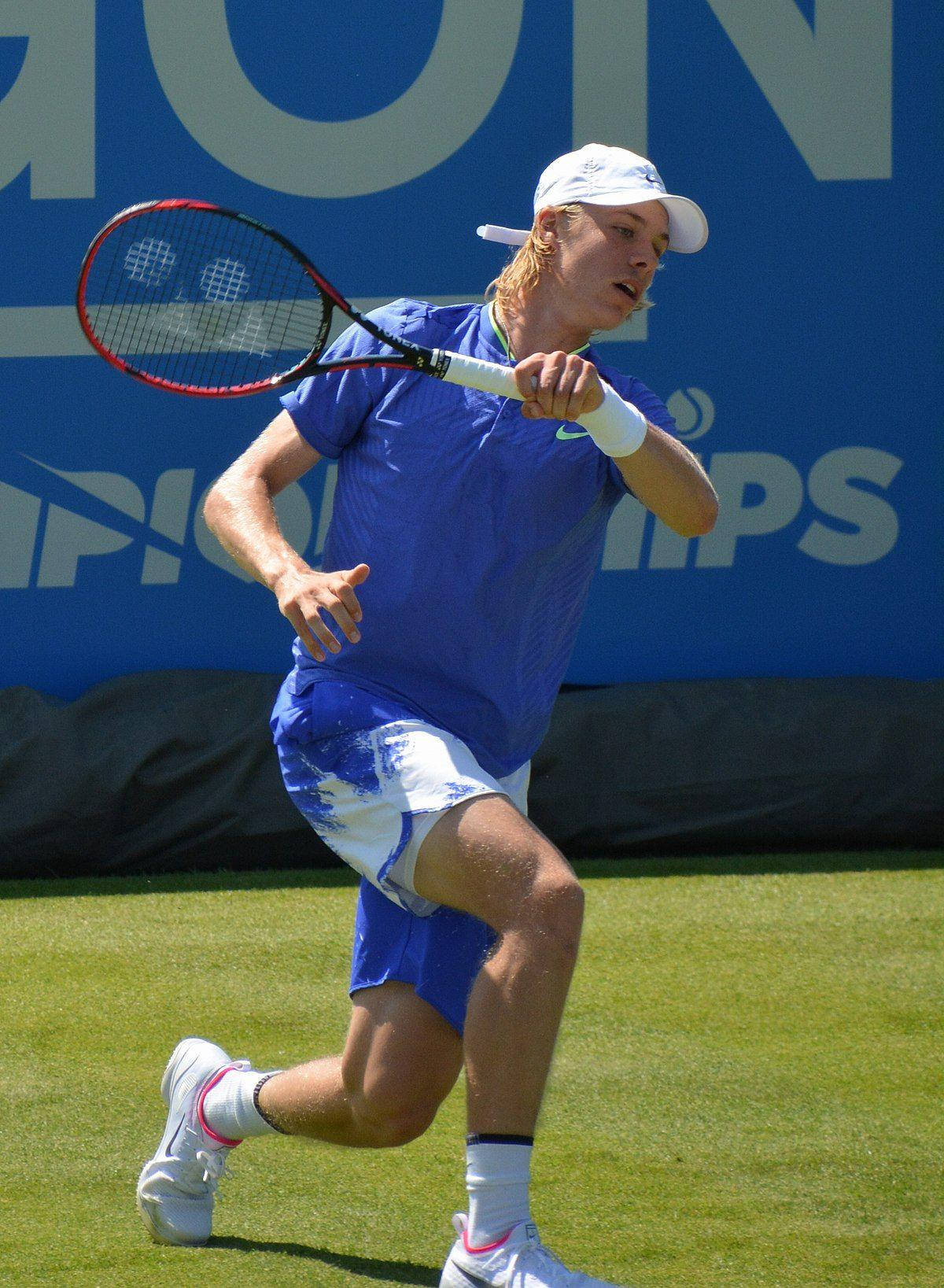 Denis Shapovalov Swinging Racket Wallpaper