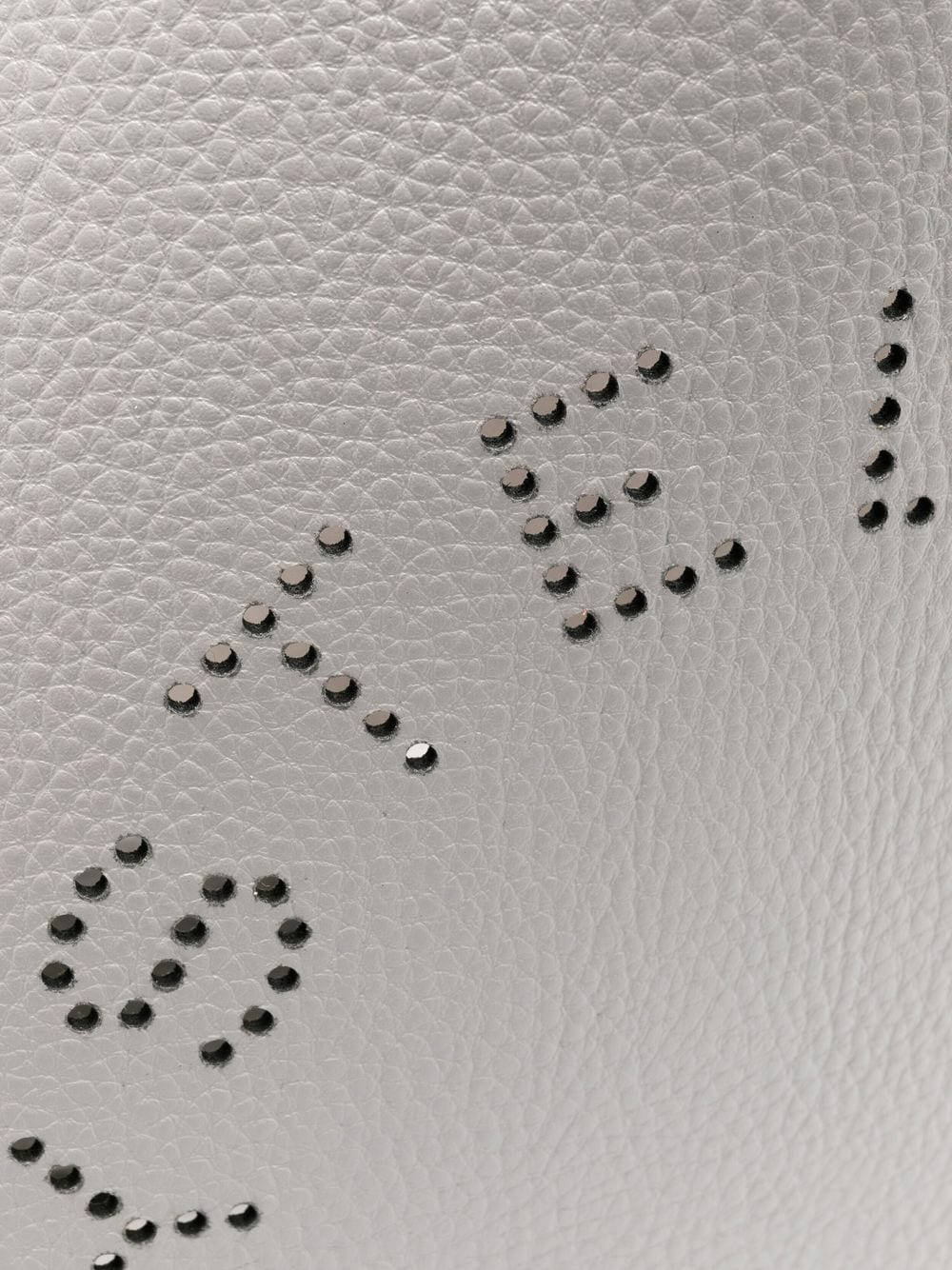 Designer Logo Studs In Detail Wallpaper