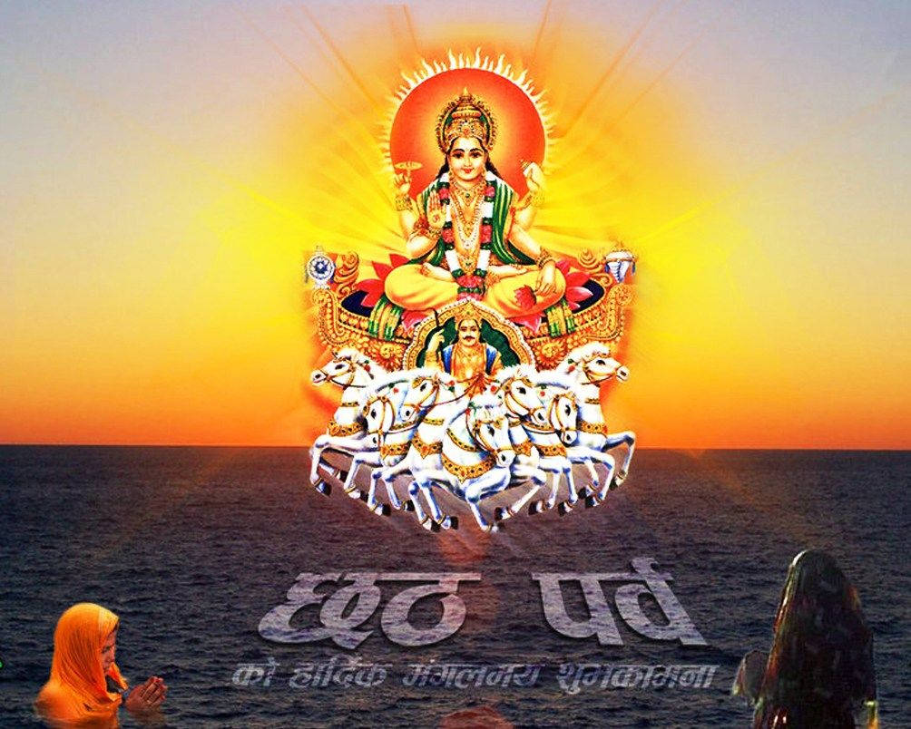 Devotees Offering Prayers To Lord Surya During Chhath Puja Wallpaper