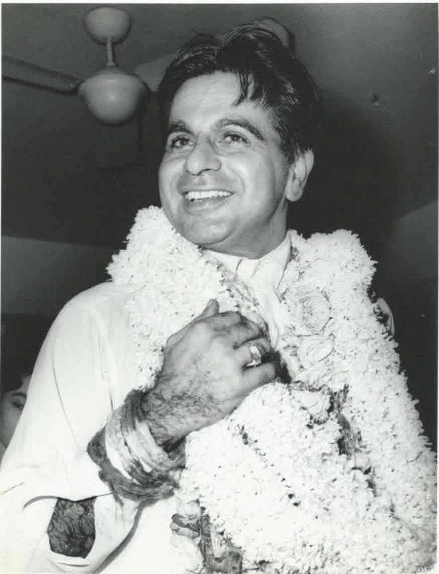 Dilip Kumar With Flower Garlands Wallpaper