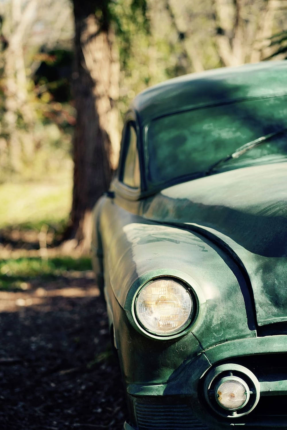 Dusty Green Vintage Car With An Integrated Phone Wallpaper